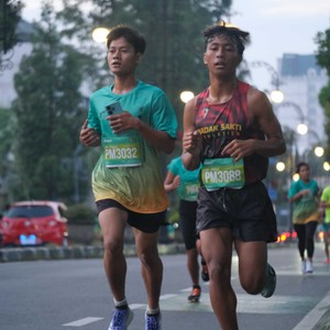 Race photo from BAUR RUN 2025