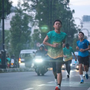 Race photo from BAUR RUN 2025