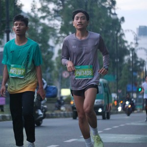 Race photo from BAUR RUN 2025