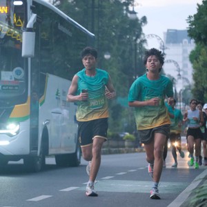 Race photo from BAUR RUN 2025