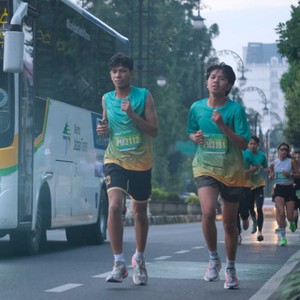Race photo from BAUR RUN 2025