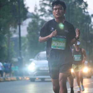 Race photo from BAUR RUN 2025