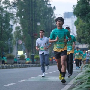 Race photo from BAUR RUN 2025