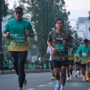 Race photo from BAUR RUN 2025
