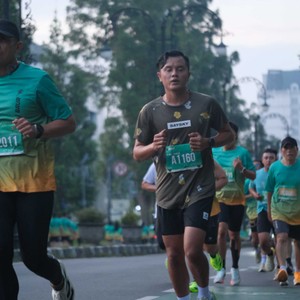 Race photo from BAUR RUN 2025