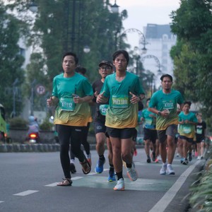 Race photo from BAUR RUN 2025