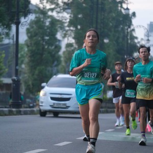Race photo from BAUR RUN 2025