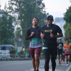 Race photo from BAUR RUN 2025
