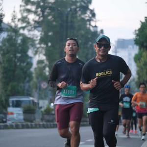 Race photo from BAUR RUN 2025