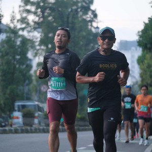 Race photo from BAUR RUN 2025