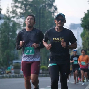Race photo from BAUR RUN 2025