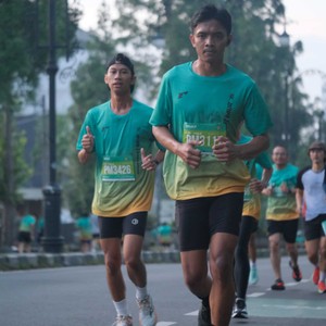 Race photo from BAUR RUN 2025
