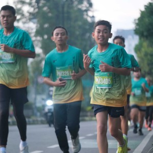 Race photo from BAUR RUN 2025