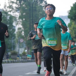 Race photo from BAUR RUN 2025