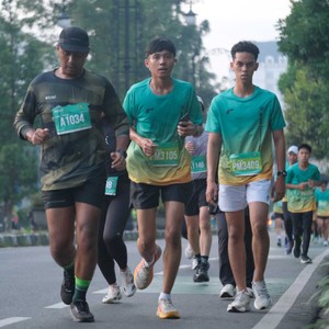 Race photo from BAUR RUN 2025