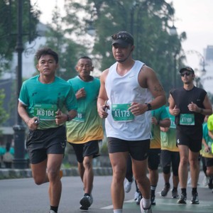 Race photo from BAUR RUN 2025
