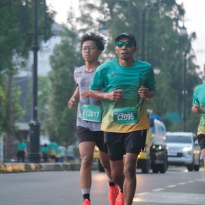 Race photo from BAUR RUN 2025
