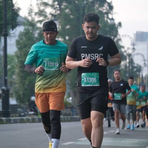 Race photo from BAUR RUN 2025