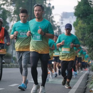 Race photo from BAUR RUN 2025
