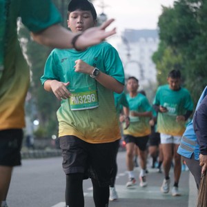 Race photo from BAUR RUN 2025