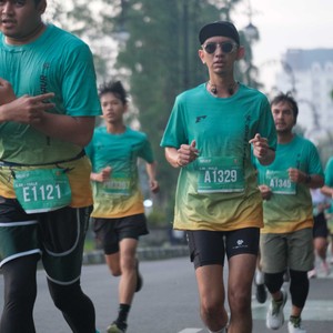 Race photo from BAUR RUN 2025