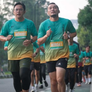 Race photo from BAUR RUN 2025