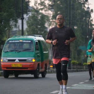 Race photo from BAUR RUN 2025