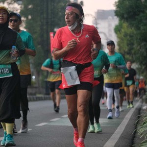 Race photo from BAUR RUN 2025