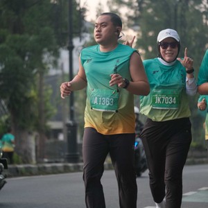 Race photo from BAUR RUN 2025
