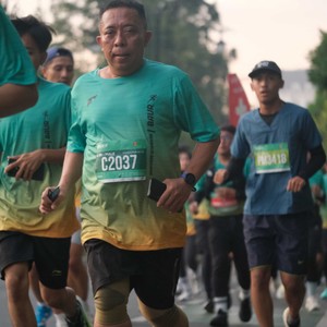 Race photo from BAUR RUN 2025
