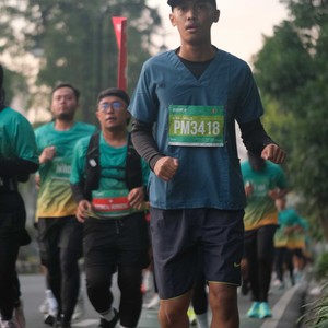Race photo from BAUR RUN 2025