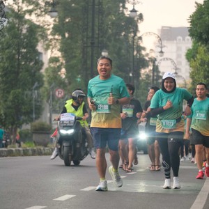 Race photo from BAUR RUN 2025