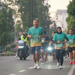 Race photo from BAUR RUN 2025