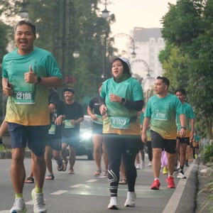 Race photo from BAUR RUN 2025