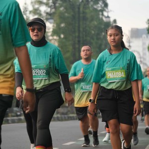 Race photo from BAUR RUN 2025
