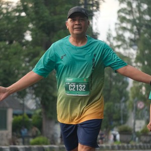 Race photo from BAUR RUN 2025