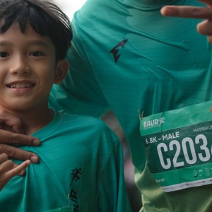 Race photo from BAUR RUN 2025