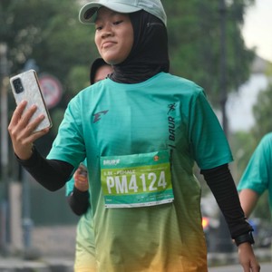 Race photo from BAUR RUN 2025