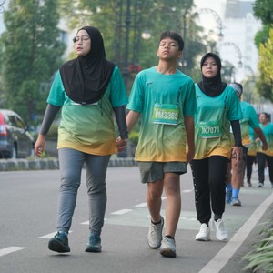 Race photo from BAUR RUN 2025
