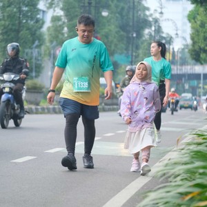 Race photo from BAUR RUN 2025