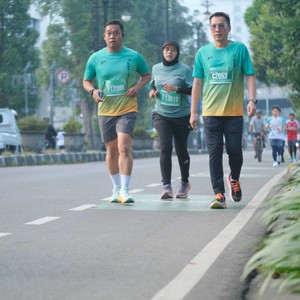 Race photo from BAUR RUN 2025