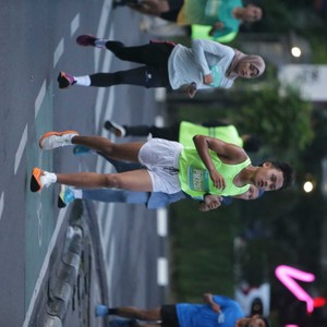 Race photo from BAUR RUN 2025