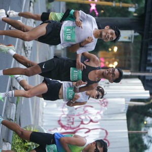 Race photo from BAUR RUN 2025