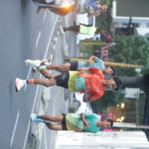 Race photo from BAUR RUN 2025