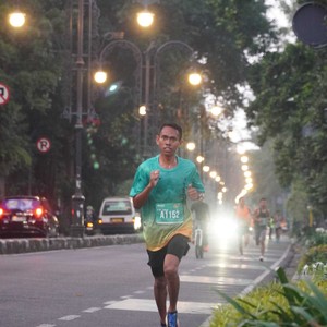 Race photo from BAUR RUN 2025