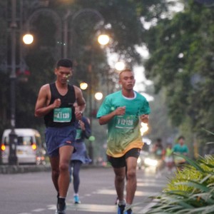 Race photo from BAUR RUN 2025