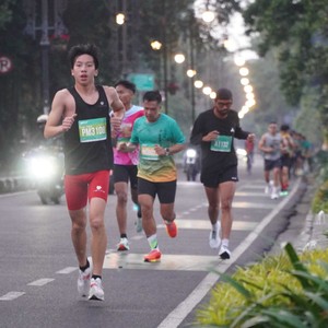 Race photo from BAUR RUN 2025