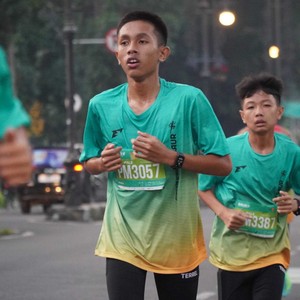 Race photo from BAUR RUN 2025