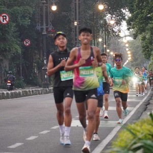Race photo from BAUR RUN 2025