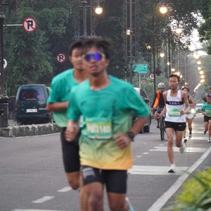 Race photo from BAUR RUN 2025